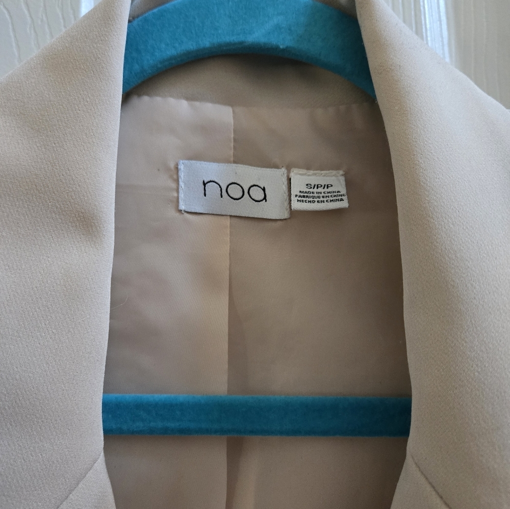 A cute, new without tag vest size Small.